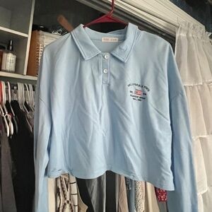 Light blue long sleeved crop top polo